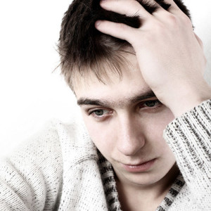 young man trauma and ptsd treatment and symptoms in counseling psychotherapy or therapy